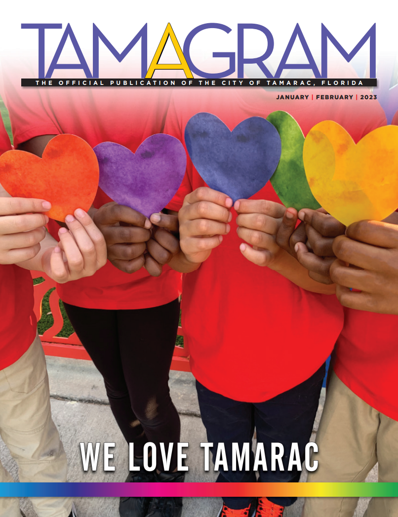 Hands holding paper hearts