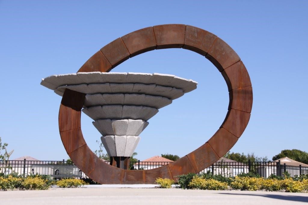 Under the Shadow of a Big Tree Sculpture